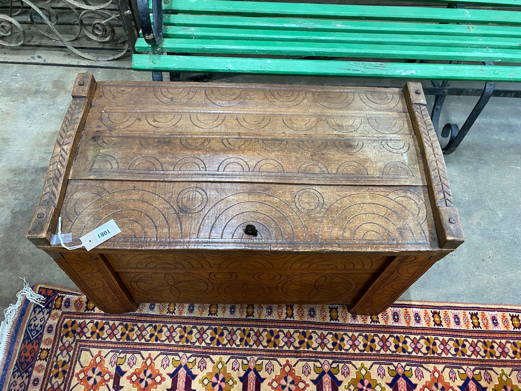 A small Scandinavian carved beech coffer, width 85cm